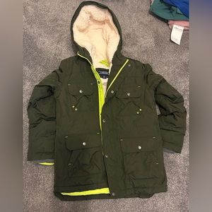 Extremely warm winter coat. M 10-12. Worn a few times. 2 inner, 6 outer pockets